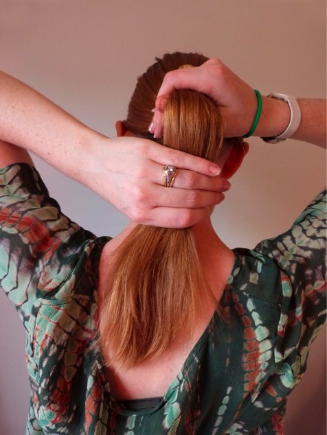 [#UbyKChromageChic Step #3 Gather all of your hair into your hand, and halfway down from where you first grabbed it, use the other hand to begin to fold the hair inward]